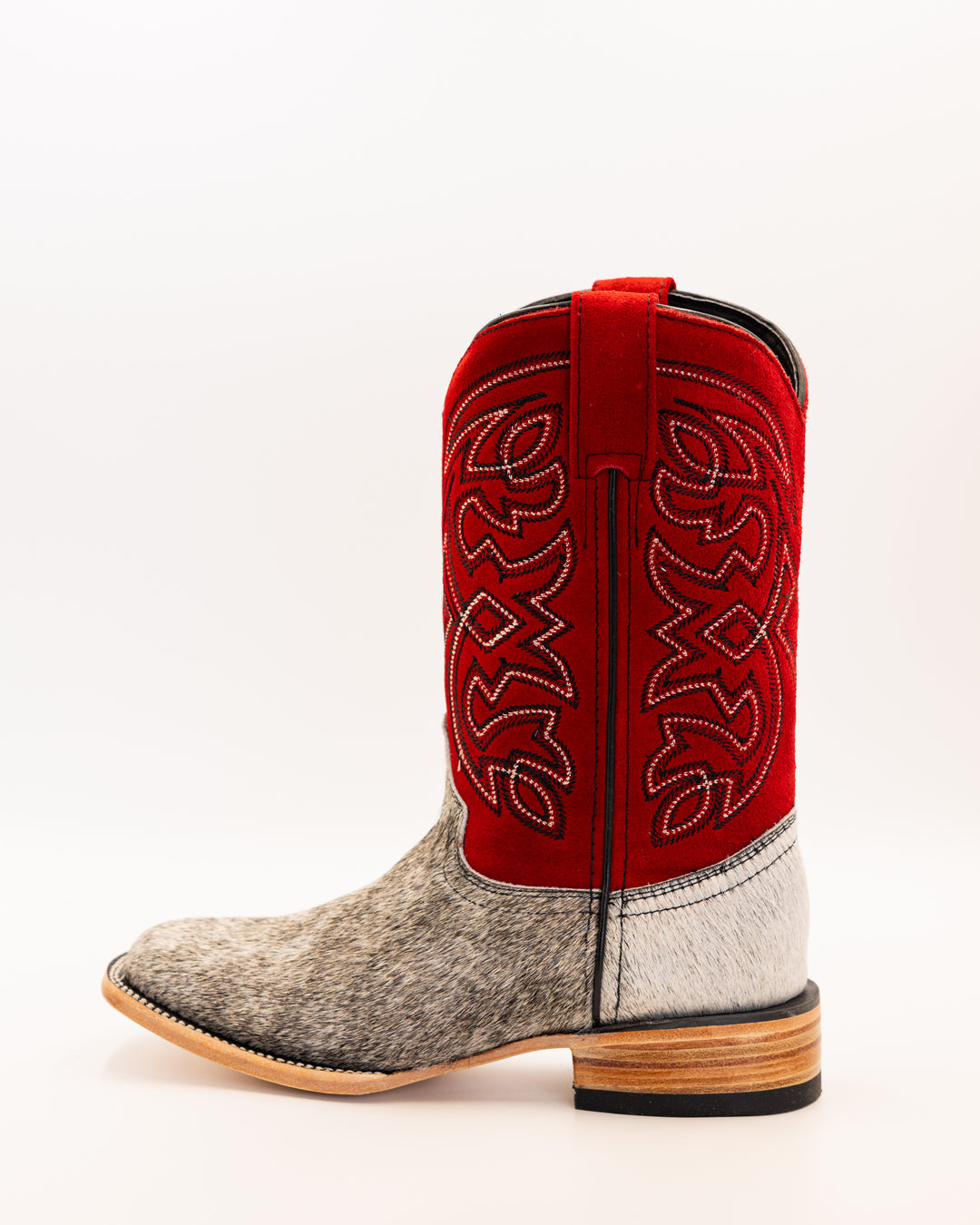Western wear for women, cowgirl outfits, southern style clothing, fringe jacket, denim snap shirt, western dress, pearl snap shirt, high-waisted jeans, ranch wear, boho cowgirl style, leather cowboy boots, embroidered boots, square toe boots, ankle cowboy boots, cowgirl hat, western belt, fringe purse, turquoise jewelry, bandana, concho belt, boot accessories, cow print fashion, rodeo handbag, rustic necklace, Nashville fashion, rodeo ready, country girl style, Cowhide, Cow boots, Leather boots