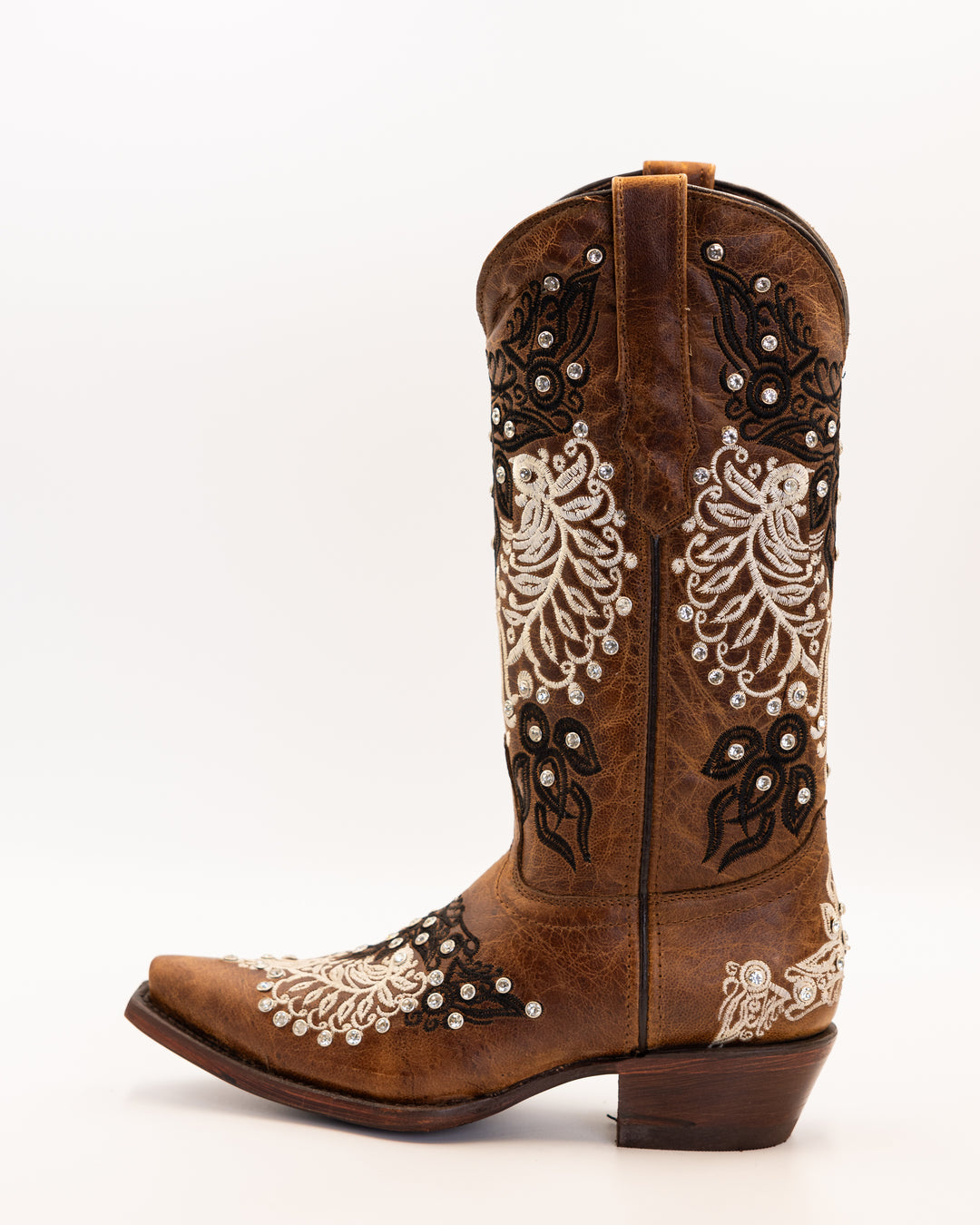 Western wear for women, cowgirl outfits, southern style clothing, fringe jacket, denim snap shirt, western dress, pearl snap shirt, high-waisted jeans, ranch wear, boho cowgirl style, leather cowboy boots, embroidered boots, square toe boots, ankle cowboy boots, cowgirl hat, western belt, fringe purse, turquoise jewelry, bandana, concho belt, boot accessories, cow print fashion, rodeo handbag, rustic necklace, Nashville fashion, rodeo ready, country girl style, Cowhide, Cow boots, Leather boots