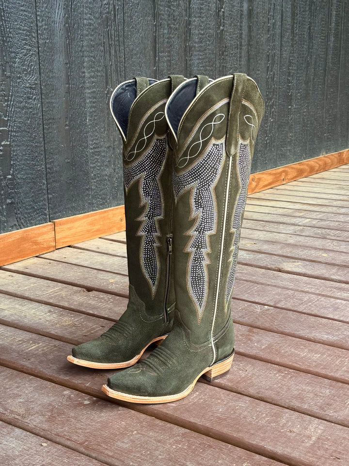 Western wear for women, cowgirl outfits, southern style clothing, fringe jacket, denim snap shirt, western dress, pearl snap shirt, high-waisted jeans, ranch wear, boho cowgirl style, leather cowboy boots, embroidered boots, square toe boots, ankle cowboy boots, cowgirl hat, western belt, fringe purse, turquoise jewelry, bandana, concho belt, boot accessories, cow print fashion, rodeo handbag, rustic necklace, Nashville fashion, rodeo ready, country girl style, 