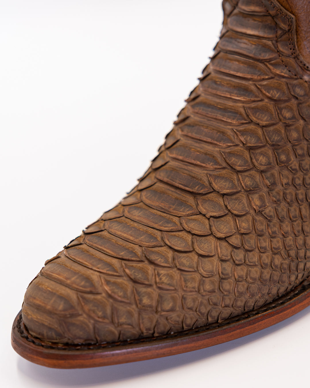 Cowboy, Boots, Western, Lucchese, Ariat, TonyLama, AndersonBean, Justin, Tecovas, Nocona, BlackJack, Stallion, Handmade, Exotic, Ostrich, Alligator, Python, Shark, SquareToe, CutterToe, RoundToe, SnipToe, Roper, Buckaroo, Ranch, Rodeo, Classic, Vintage, Leather, Premium, HandmadeBoots, WorkBoots, Durable, Genuine, Suede, Caiman, Lizard, Crocodile, FullQuill, RanchWear, Traditional, Heritage, Rustic, TexasStyle, MensBoots