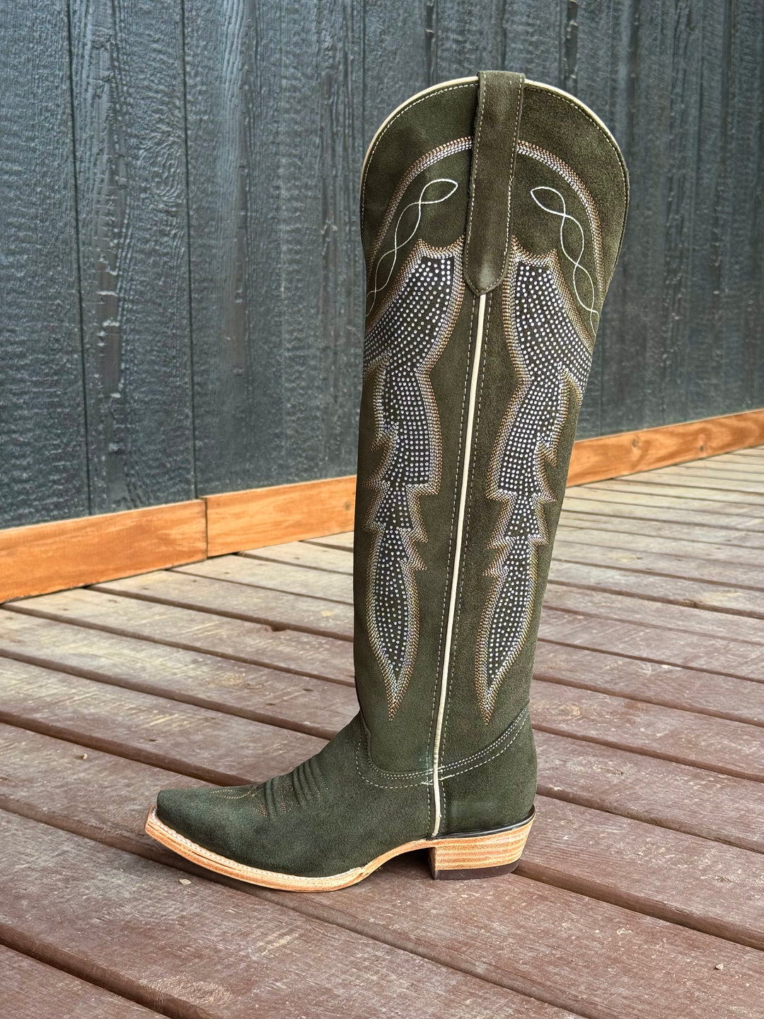 Western wear for women, cowgirl outfits, southern style clothing, fringe jacket, denim snap shirt, western dress, pearl snap shirt, high-waisted jeans, ranch wear, boho cowgirl style, leather cowboy boots, embroidered boots, square toe boots, ankle cowboy boots, cowgirl hat, western belt, fringe purse, turquoise jewelry, bandana, concho belt, boot accessories, cow print fashion, rodeo handbag, rustic necklace, Nashville fashion, rodeo ready, country girl style, 