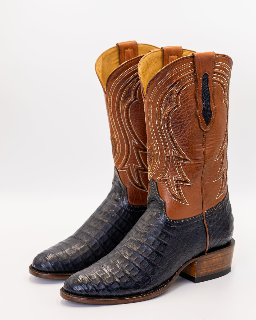 ostrich boots, full quill ostrich boots, caiman boots, stingray boots, alligator boots, American alligator boots, pirarucu boots, python boots, fish skin boots, lizard boots, crocodile boots, calf skin boots, cowhide boots, exotic leather boots, exotic western boots, men’s exotic boots, genuine exotic boots, men’s cowboy boots, western boots, country boots, handmade boots, luxury western boots, premium exotic leather, ranch style boots, Texas style boots, round toe boots, square toe boots, cutter toe boots
