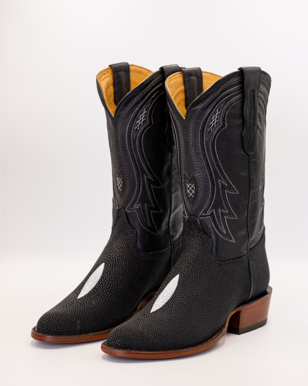 ostrich boots, full quill ostrich boots, caiman boots, stingray boots, alligator boots, American alligator boots, pirarucu boots, python boots, fish skin boots, lizard boots, crocodile boots, calf skin boots, cowhide boots, exotic leather boots, exotic western boots, men’s exotic boots, genuine exotic boots, men’s cowboy boots, western boots, country boots, handmade boots, luxury western boots, premium exotic leather, ranch style boots, Texas style boots, round toe boots, square toe boots, cutter toe boots