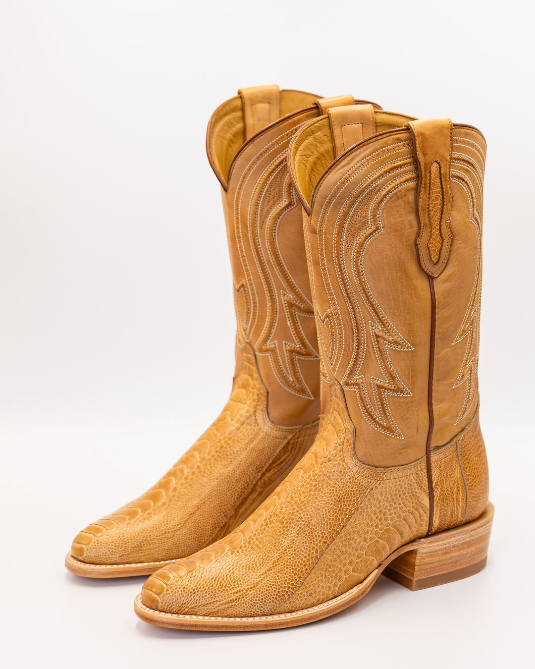 ostrich boots, full quill ostrich boots, caiman boots, stingray boots, alligator boots, American alligator boots, pirarucu boots, python boots, fish skin boots, lizard boots, crocodile boots, calf skin boots, cowhide boots, exotic leather boots, exotic western boots, men’s exotic boots, genuine exotic boots, men’s cowboy boots, western boots, country boots, handmade boots, luxury western boots, premium exotic leather, ranch style boots, Texas style boots, round toe boots, square toe boots, cutter toe boots