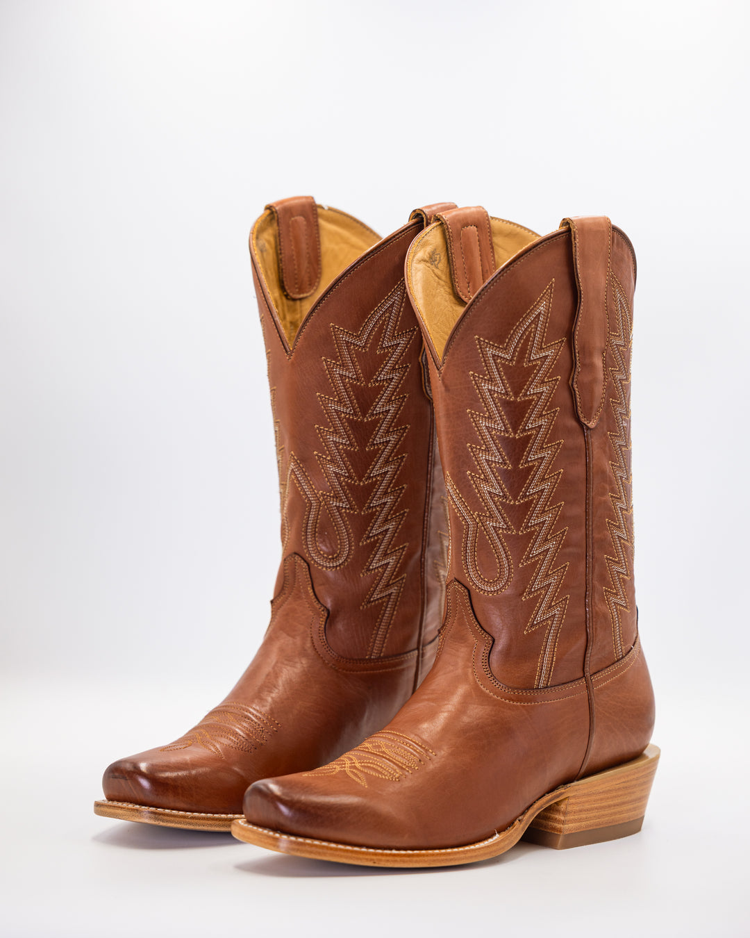 Cowboy, Boots, Western, Lucchese, Ariat, TonyLama, AndersonBean, Justin, Tecovas, Nocona, BlackJack, Stallion, Handmade, Exotic, Ostrich, Alligator, Python, Shark, SquareToe, CutterToe, RoundToe, SnipToe, Roper, Buckaroo, Ranch, Rodeo, Classic, Vintage, Leather, Premium, HandmadeBoots, WorkBoots, Durable, Genuine, Suede, Caiman, Lizard, Crocodile, FullQuill, RanchWear, Traditional, Heritage, Rustic, TexasStyle, MensBoots