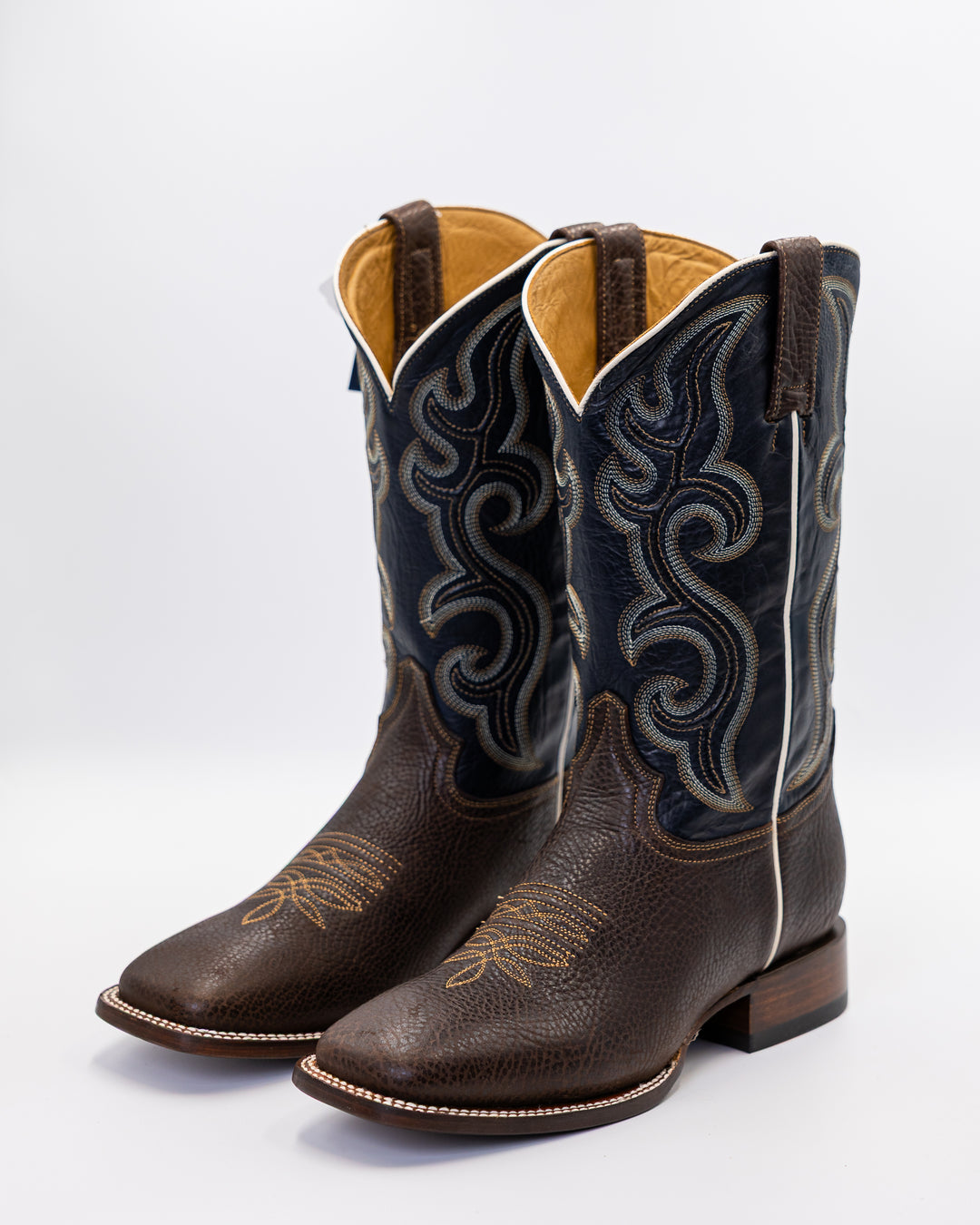 ostrich boots, full quill ostrich boots, caiman boots, stingray boots, alligator boots, American alligator boots, pirarucu boots, python boots, fish skin boots, lizard boots, crocodile boots, calf skin boots, cowhide boots, exotic leather boots, exotic western boots, men’s exotic boots, genuine exotic boots, men’s cowboy boots, western boots, country boots, handmade boots, luxury western boots, premium exotic leather, ranch style boots, Texas style boots, round toe boots, square toe boots, cutter toe boots