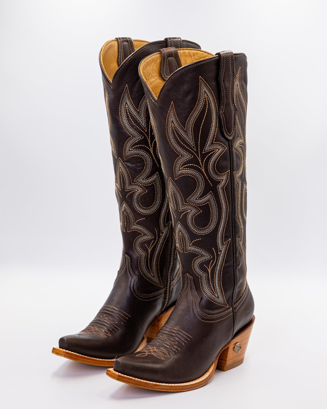 boots, women’s boots, cowgirl boots, western boots, country boots, snip toe, square toe, pointed toe, round toe, leather boots, suede boots, exotic boots, cowhide leather, genuine leather, calf leather, tall boots, mid-calf boots, ankle boots, stacked heel, 13-inch shaft, pull straps, stitched design, rodeo style, ranch wear, Texas style, handmade boots, vintage western, distressed leather, classic cowgirl, modern western, fashion boots, everyday wear, durable boots, high-quality leather, country fashion,