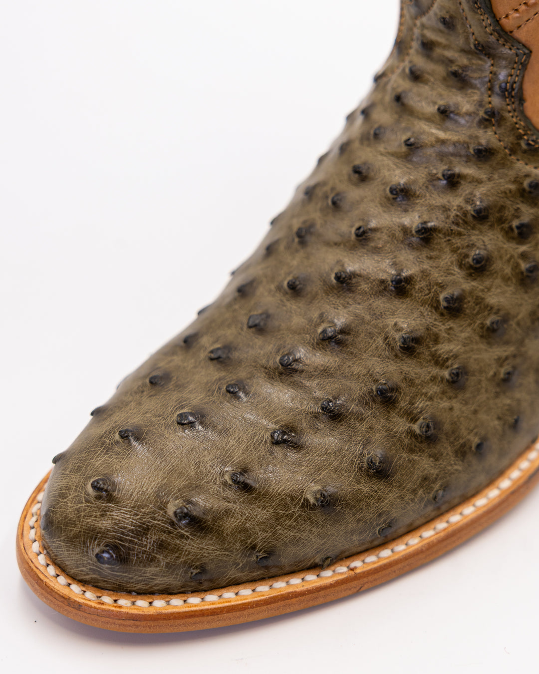 Cowboy, Boots, Western, Lucchese, Ariat, TonyLama, AndersonBean, Justin, Tecovas, Nocona, BlackJack, Stallion, Handmade, Exotic, Ostrich, Alligator, Python, Shark, SquareToe, CutterToe, RoundToe, SnipToe, Roper, Buckaroo, Ranch, Rodeo, Classic, Vintage, Leather, Premium, HandmadeBoots, WorkBoots, Durable, Genuine, Suede, Caiman, Lizard, Crocodile, FullQuill, RanchWear, Traditional, Heritage, Rustic, TexasStyle, MensBoots