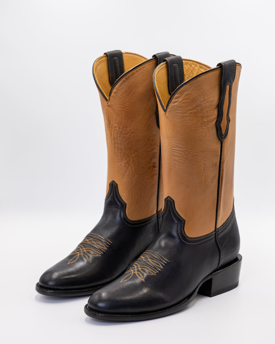 ostrich boots, full quill ostrich boots, caiman boots, stingray boots, alligator boots, American alligator boots, pirarucu boots, python boots, fish skin boots, lizard boots, crocodile boots, calf skin boots, cowhide boots, exotic leather boots, exotic western boots, men’s exotic boots, genuine exotic boots, men’s cowboy boots, western boots, country boots, handmade boots, luxury western boots, premium exotic leather, ranch style boots, Texas style boots, round toe boots, square toe boots, cutter toe boots