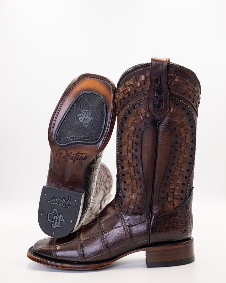 Men’s Caiman belly boots, full quill leather, exotic skin footwear, western-style boots, genuine hide craftsmanship, handmade cowboy boots, premium leather design, smooth finish ostrich, rustic men’s footwear, luxury Western fashion, traditional bootmaking, custom leather boots, durable ranch boots, authentic exotic leather, and high-quality Western wear.Western wear, Cowboy boots, Cowgirl boots, Western boots, Leather cowboy boots, Handmade cowboy boots, Western clothing, Country apparel, Rodeo gear, Ariat