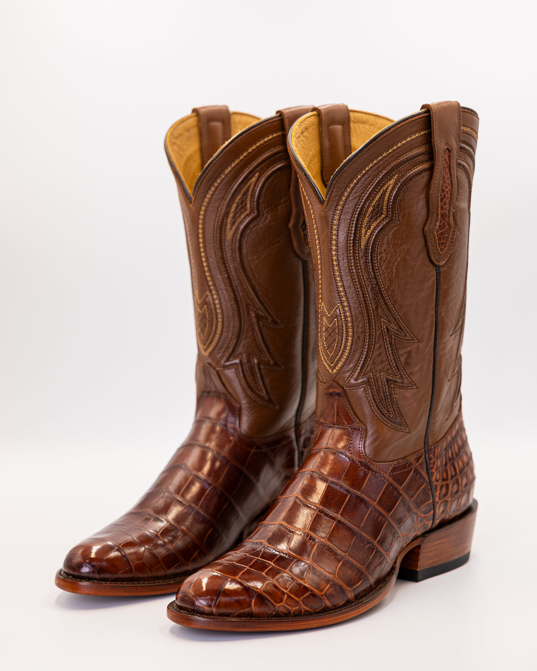 ostrich boots, full quill ostrich boots, caiman boots, stingray boots, alligator boots, American alligator boots, pirarucu boots, python boots, fish skin boots, lizard boots, crocodile boots, calf skin boots, cowhide boots, exotic leather boots, exotic western boots, men’s exotic boots, genuine exotic boots, men’s cowboy boots, western boots, country boots, handmade boots, luxury western boots, premium exotic leather, ranch style boots, Texas style boots, round toe boots, square toe boots, cutter toe boots