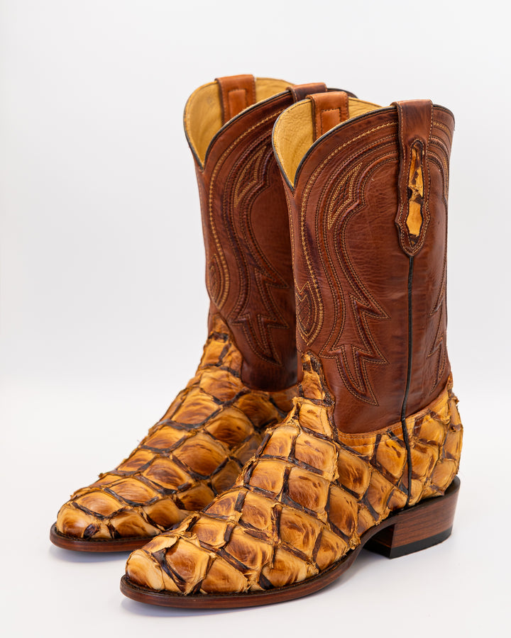 ostrich boots, full quill ostrich boots, caiman boots, stingray boots, alligator boots, American alligator boots, pirarucu boots, python boots, fish skin boots, lizard boots, crocodile boots, calf skin boots, cowhide boots, exotic leather boots, exotic western boots, men’s exotic boots, genuine exotic boots, men’s cowboy boots, western boots, country boots, handmade boots, luxury western boots, premium exotic leather, ranch style boots, Texas style boots, round toe boots, square toe boots, cutter toe boots
