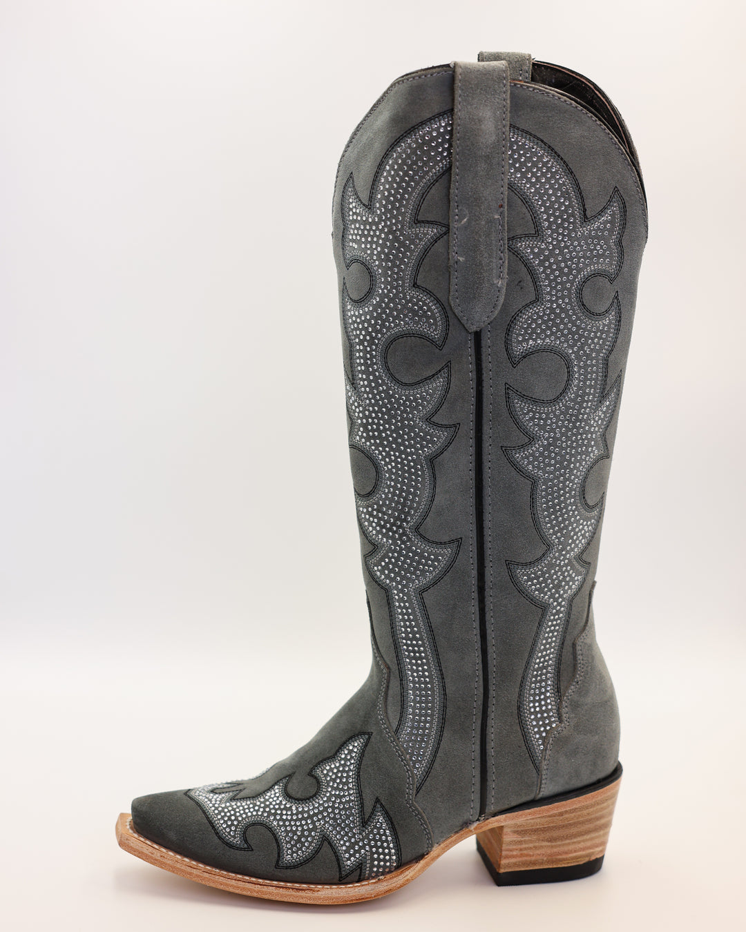 Western wear for women, cowgirl outfits, southern style clothing, fringe jacket, denim snap shirt, western dress, pearl snap shirt, high-waisted jeans, ranch wear, boho cowgirl style, leather cowboy boots, embroidered boots, square toe boots, ankle cowboy boots, cowgirl hat, western belt, fringe purse, turquoise jewelry, bandana, concho belt, boot accessories, cow print fashion, rodeo handbag, rustic necklace, Nashville fashion, rodeo ready, country girl style, 