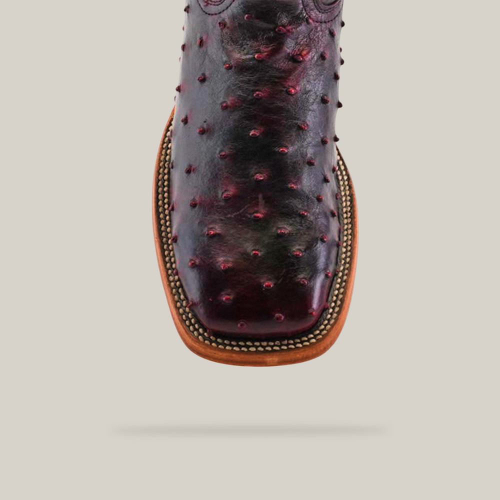 Men’s ostrich boots, full quill leather, exotic skin footwear, western-style boots, genuine hide craftsmanship, handmade cowboy boots, premium leather design, smooth finish ostrich, rustic men’s footwear, luxury Western fashion, traditional bootmaking, custom leather boots, durable ranch boots, authentic exotic leather, and high-quality Western wear.
