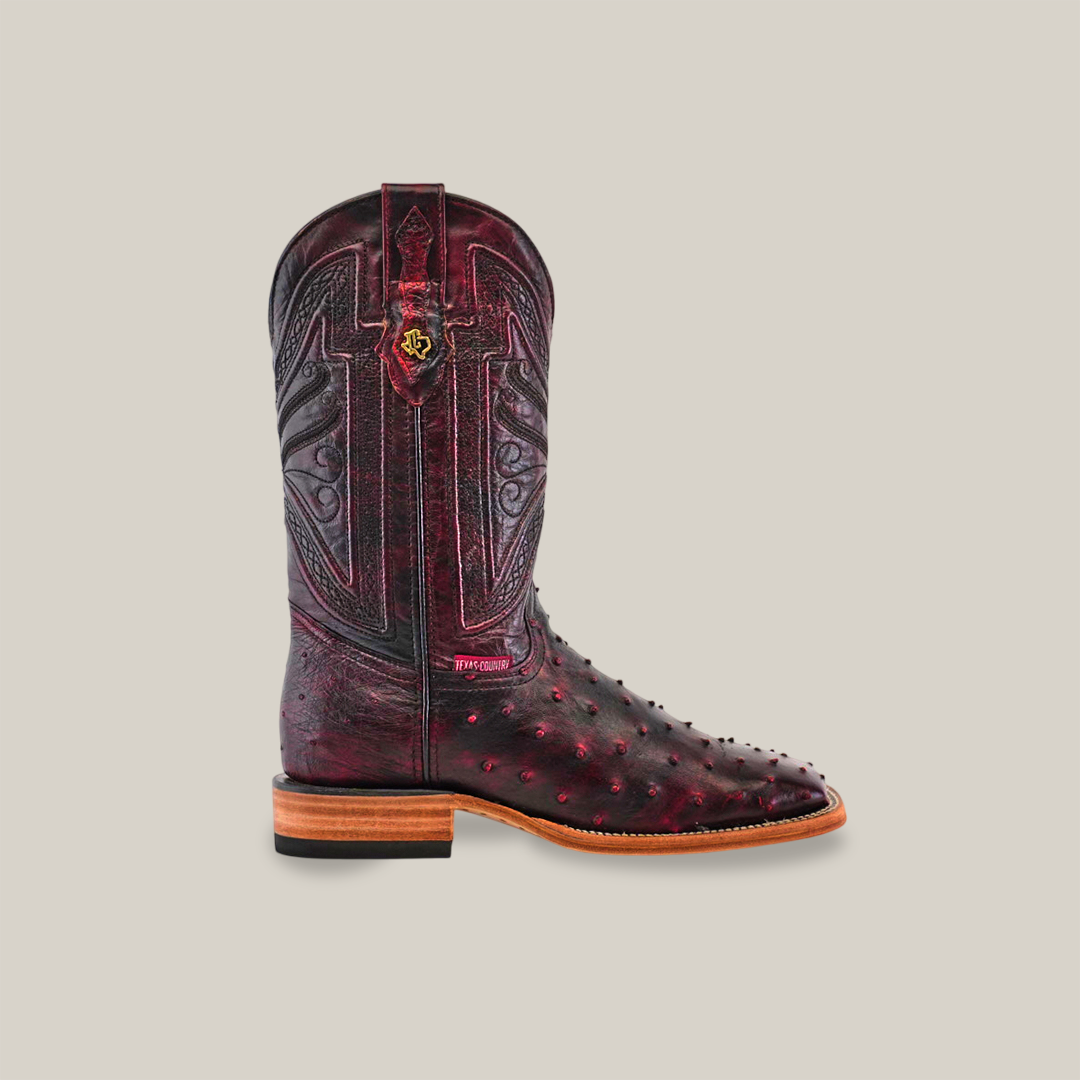 Men’s ostrich boots, full quill leather, exotic skin footwear, western-style boots, genuine hide craftsmanship, handmade cowboy boots, premium leather design, smooth finish ostrich, rustic men’s footwear, luxury Western fashion, traditional bootmaking, custom leather boots, durable ranch boots, authentic exotic leather, and high-quality Western wear.