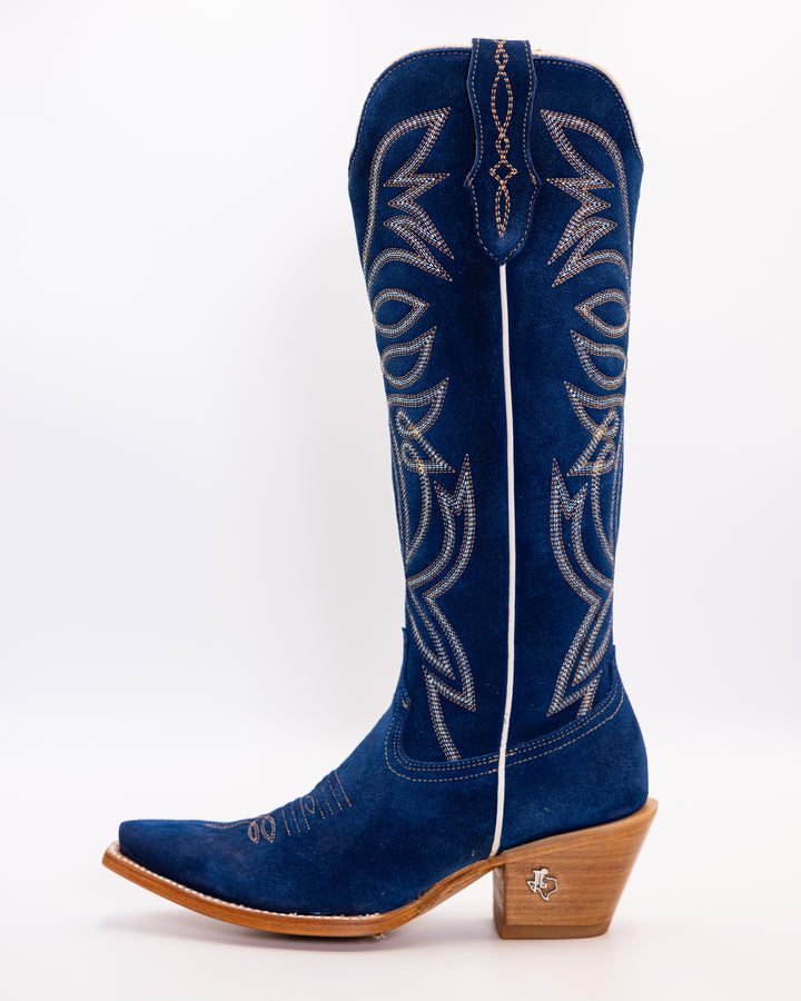 Western wear for women, cowgirl outfits, southern style clothing, fringe jacket, denim snap shirt, western dress, pearl snap shirt, high-waisted jeans, ranch wear, boho cowgirl style, leather cowboy boots, embroidered boots, square toe boots, ankle cowboy boots, cowgirl hat, western belt, fringe purse, turquoise jewelry, bandana, concho belt, boot accessories, cow print fashion, rodeo handbag, rustic necklace, Nashville fashion, rodeo ready, country girl style, 