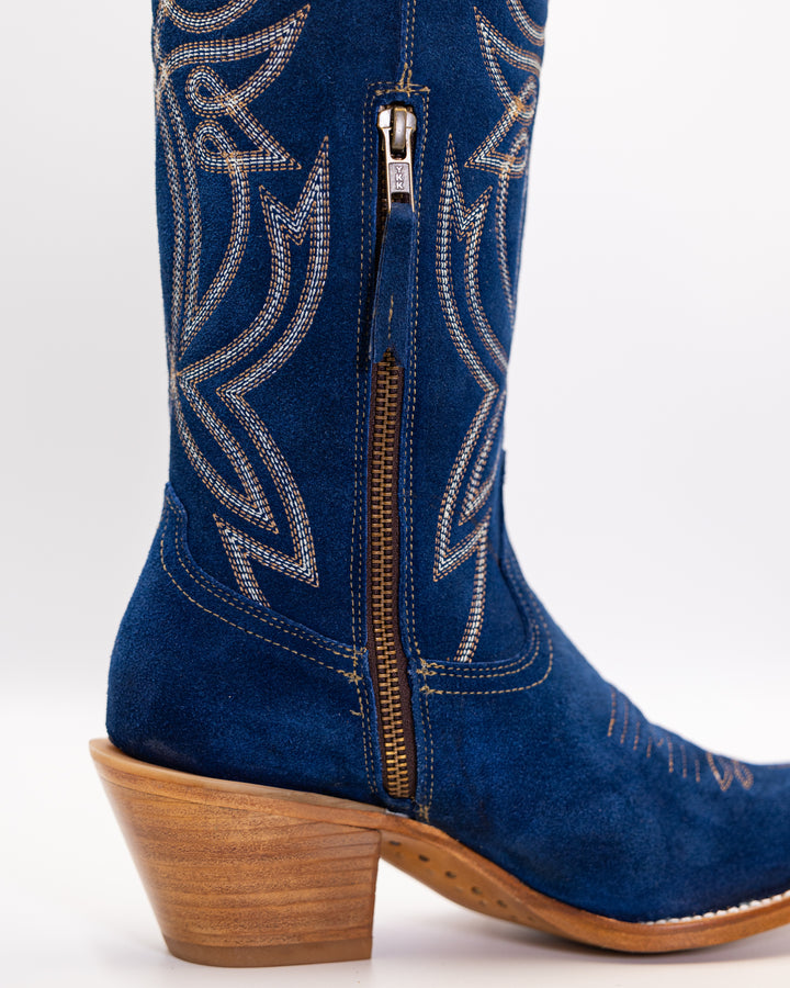 Western wear for women, cowgirl outfits, southern style clothing, fringe jacket, denim snap shirt, western dress, pearl snap shirt, high-waisted jeans, ranch wear, boho cowgirl style, leather cowboy boots, embroidered boots, square toe boots, ankle cowboy boots, cowgirl hat, western belt, fringe purse, turquoise jewelry, bandana, concho belt, boot accessories, cow print fashion, rodeo handbag, rustic necklace, Nashville fashion, rodeo ready, country girl style, 